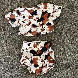 Cow print baby outfit